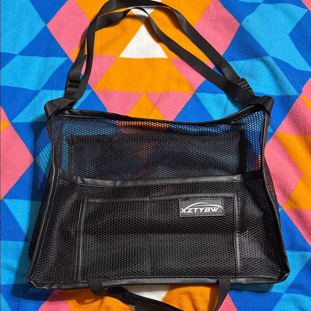 Black mesh handbag holder for car seat